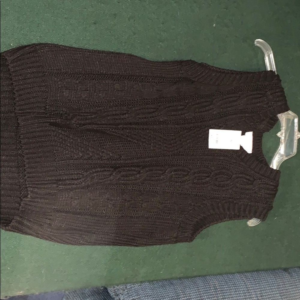 Sleeveless black sweater